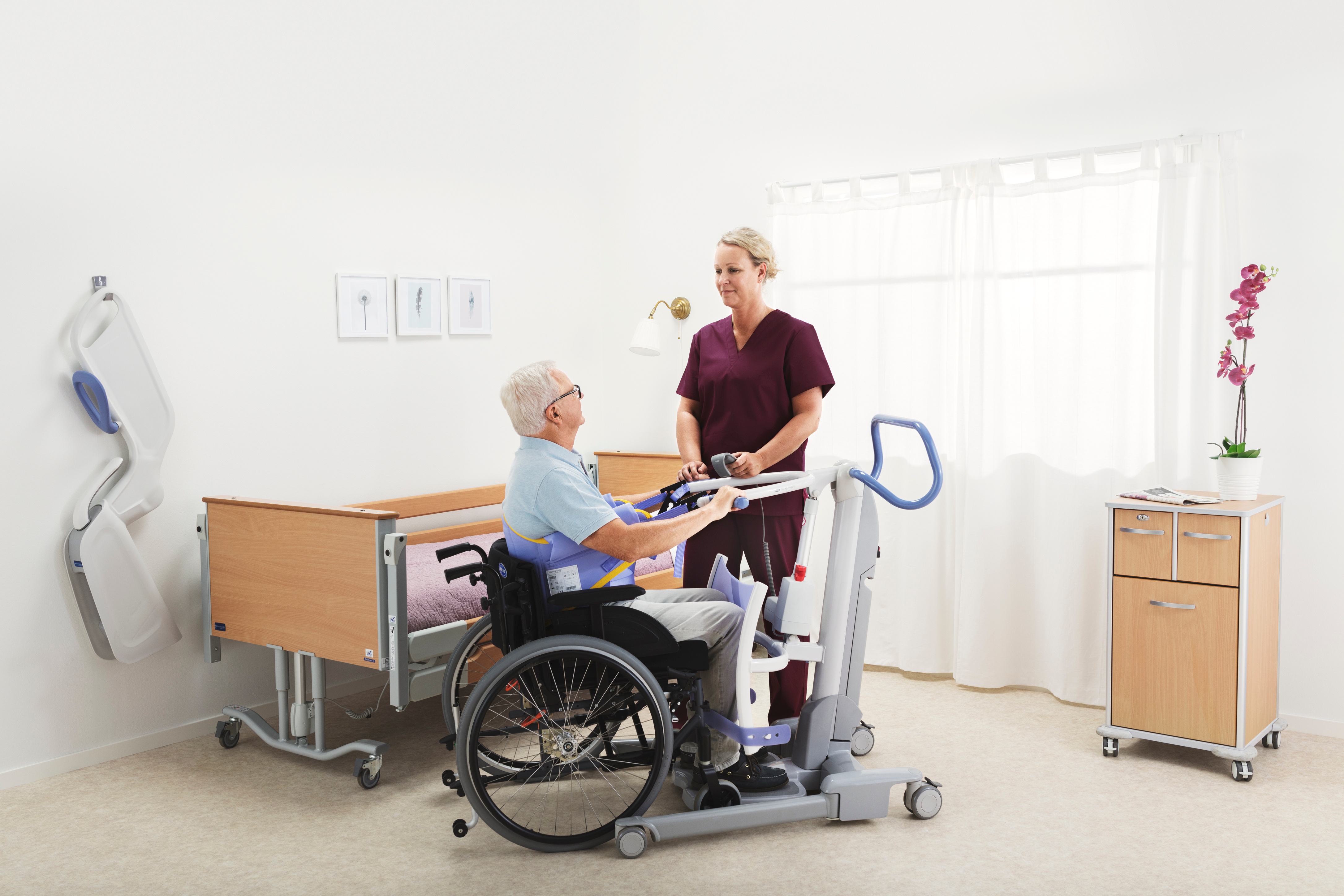 How many sit-to-stand transfers do caregivers perform with their patients per day?